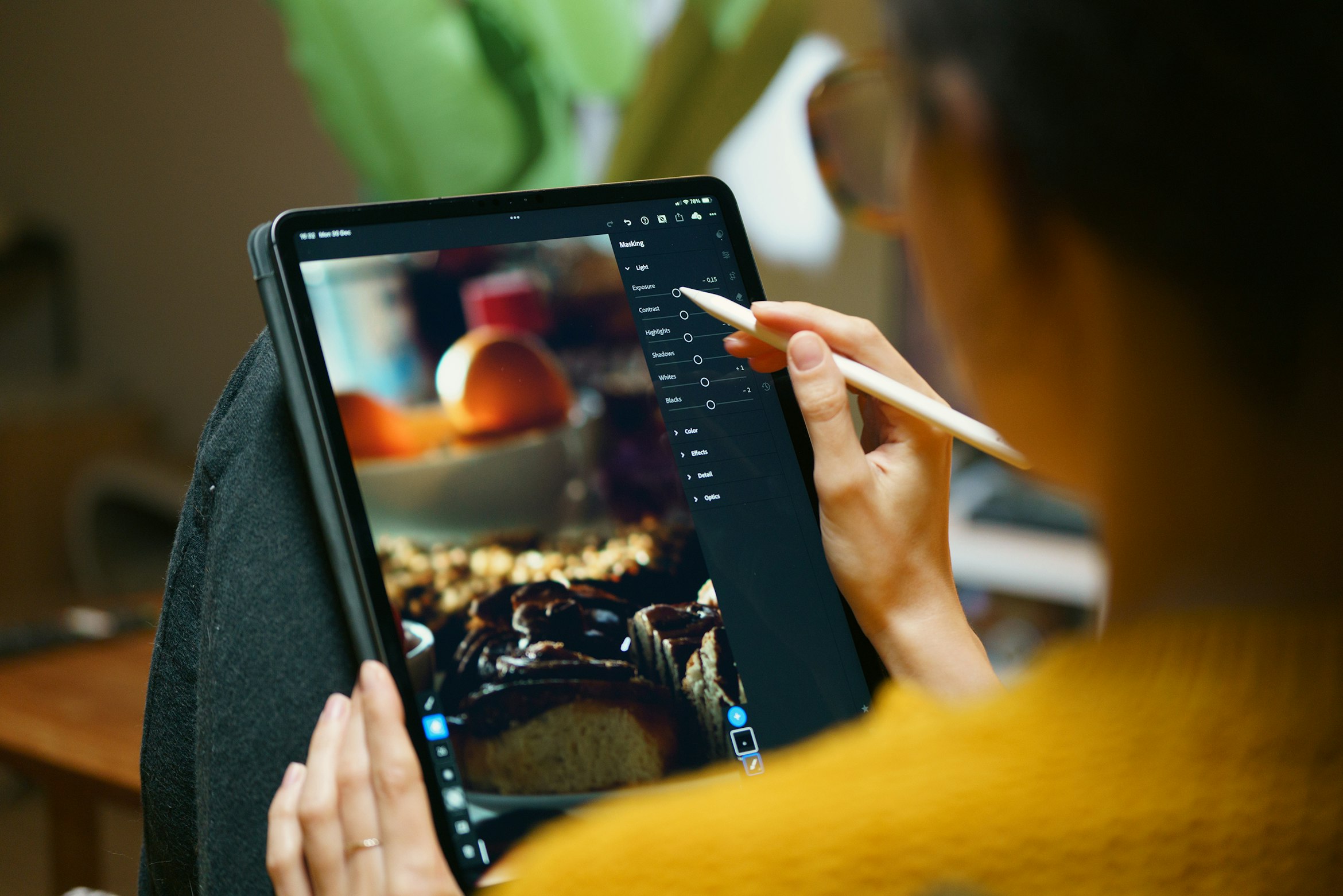 Person sketching on a tablet — content creation with free AI tools in 2026